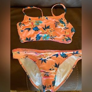Xhilaration swim suit. Top medium bottoms Large.